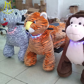 Hansel Guangzhou plush moving toy animal toy horse on 4 wheels for kids fournisseur